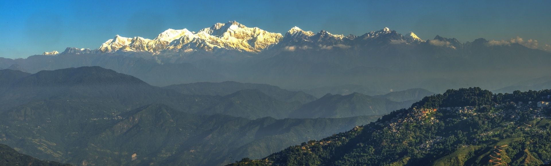 Panoramic view of an Indian mountain landscape where tea is grown.